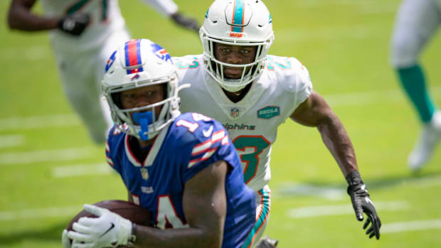 Miami Dolphins cornerback Noah Igbinoghene (23) is beat for a touchdown by Buffalo Bills wide receiver Stefon Diggs (14) at Hard Rock Stadium in Miami Gardens, September 20, 2020. [ALLEN EYESTONE/The Palm Beach Post]